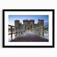 Framed wall art collection featuring stunning landscapes and castles, presented in a sleek black frame with a mat, ideal for enhancing home decor and interior design aesthetics.