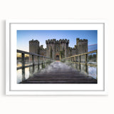 Framed wall art collection showcasing a stunning landscape and castle design, featuring a white mat and sleek frame, perfect for elegant home decor.