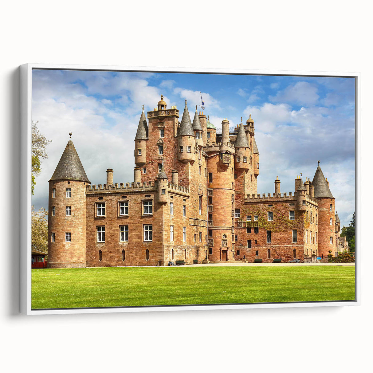 Framed canvas wall art showcasing a picturesque landscape with a majestic castle, presented in a white frame, ideal for enhancing home decor with elegance.
