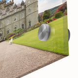 Close-up of a vibrant acrylic glass wall art piece showcasing a stunning landscape with a medieval castle, featuring rich colors and intricate details that enhance any decor.