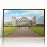 Framed acrylic wall art featuring a stunning view of a majestic castle amidst vibrant landscapes, accented with a gold frame, perfect for home decor.