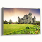 Framed canvas wall art showcasing a stunning landscape with a majestic castle, elegantly designed in silver tones, perfect for home decor. The artwork captures intricate details of the scene, providing a sophisticated touch to any room.