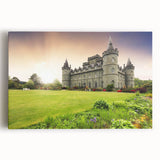 Stretched canvas artwork showcasing a vibrant landscape with a majestic castle, surrounded by lush greenery and a clear blue sky, perfect for home decor.