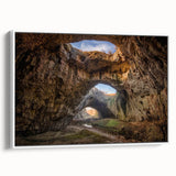 Framed canvas wall art showcasing a stunning landscape with cave formations, featuring a white frame. Ideal for home decor, enhancing modern interiors with natural beauty.