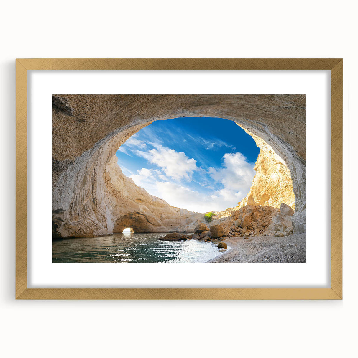 Framed wall art print showcasing a stunning cave landscape design with a luxurious gold frame and matting, perfect for enhancing modern home decor.