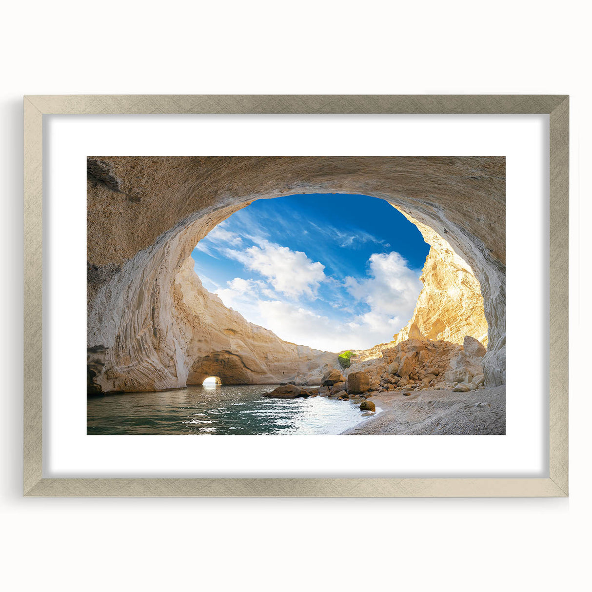 Framed wall art featuring a stunning landscapes and caves design, presented in a sleek silver frame with a white mat, ideal for home décor enhancement.