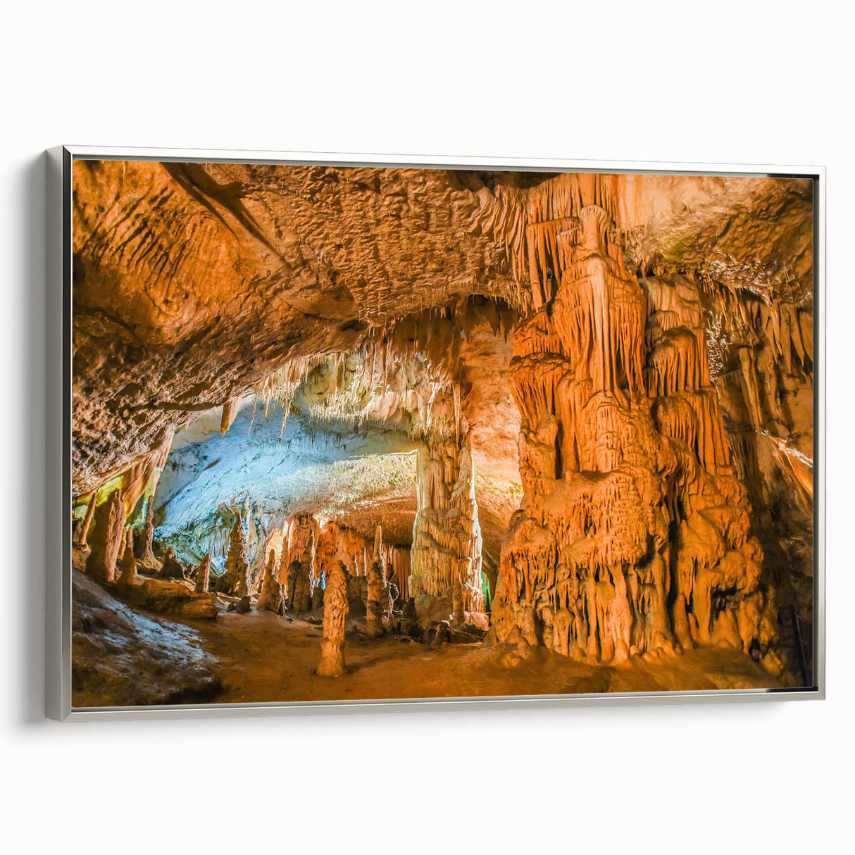 Framed canvas wall art showcasing a stunning cave landscape design, featuring silver accents and vibrant colors, perfect for modern home decor.
