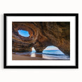 Framed black wall art featuring a stunning cave landscape design with a mat, showcasing intricate details and contrasting colors, perfect for modern home decor.