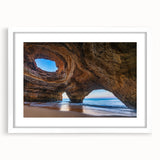 Framed wall art collection featuring a stunning landscape design with cave elements. The artwork is presented in a sleek white frame with a mat, showcasing vibrant colors and intricate details, perfect for enhancing any modern interior decor.
