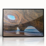 Framed acrylic wall art showcasing a stunning landscape with cave designs in vibrant colors, featuring a sleek black frame, ideal for modern home decor.