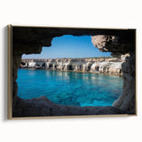 Framed canvas wall art showcasing a stunning landscape of caves with intricate designs, featuring a gold frame that enhances its elegance and visual appeal.