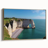 Framed canvas wall art showcasing a stunning landscape of cliffs in golden hues, designed to enhance any modern decor, with a sleek side view highlighting its elegant finish.