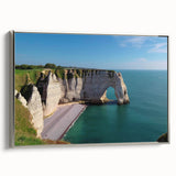 Framed canvas wall art showcasing a stunning landscape of cliffs, featuring vibrant colors and intricate details, elegantly displayed with a silver frame.