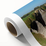 Vibrant rolled canvas artwork showcasing a stunning cliff landscape, featuring rich colors and detailed textures, ideal for home decor or gallery display.