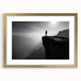 Framed wall art featuring a serene landscape of cliffs and mountains, with a gold frame and mat, ideal for enhancing modern home decor with natural beauty.
