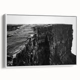 Framed canvas wall art showcasing a stunning landscape of cliffs, featuring vibrant colors and intricate details, ideal for enhancing any modern home decor.