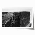 Vibrant rolled print showcasing a stunning landscape of cliffs and ocean waves, perfect for home decor, emphasizing natural beauty and tranquility.
