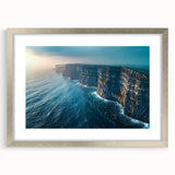 Framed wall art showcasing a stunning landscape of cliffs, featuring vibrant colors and detailed textures in a silver mat. Perfect for enhancing home decor.