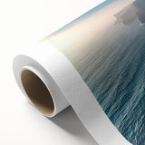 Rolled canvas artwork showcasing a vibrant landscape with dramatic cliffs and a colorful sunset, designed for wall decor, perfect for nature enthusiasts.