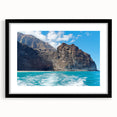 Framed black wall art featuring a stunning landscape of cliffs, showcasing detailed textures and vibrant colors, perfect for modern home decor.