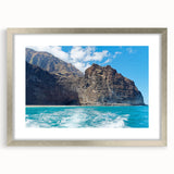 Framed wall art showcasing a stunning landscape of cliffs, featuring a silver mat and elegant frame, perfect for enhancing modern home decor.