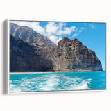 Framed canvas wall art showcasing a coastal cliff landscape with vibrant colors and intricate details, set against a white background, perfect for modern decor.
