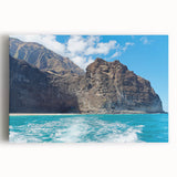 Stretched canvas wall art featuring a vibrant landscape design with cliffs and a serene sky, perfect for adding a nature-inspired touch to home decor.