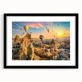 Framed landscape wall art featuring a dramatic cliff scene with vibrant colors, black mat, and sleek black frame, perfect for enhancing modern home decor.