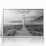 Framed acrylic wall art featuring a stunning landscape of cliffs, displayed in white, perfect for modern home decor. Adds a serene touch to any living space.