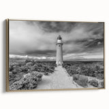 Framed canvas wall art featuring a stunning landscape of cliffs at sunset, highlighting vibrant gold accents and soft hues. Ideal for modern home decor.