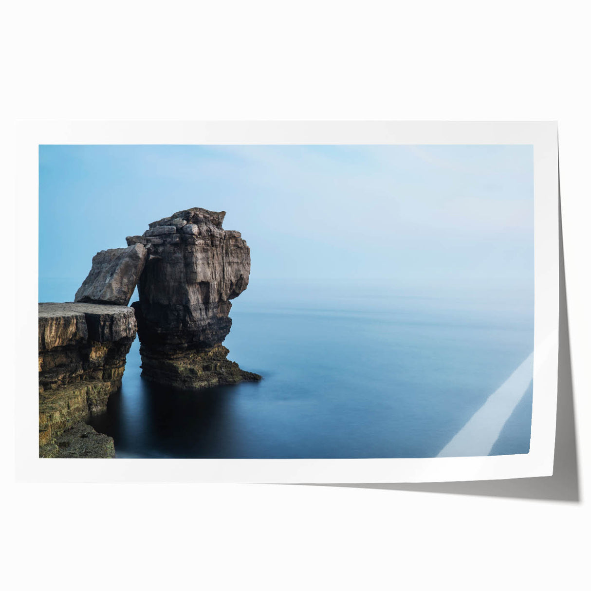 Vibrant rolled print showcasing a dramatic cliff landscape with rich colors and textures, ideal for enhancing home decor or art collections.