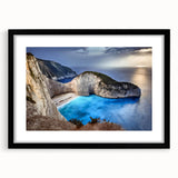 Framed black wall art showcasing a stunning landscape of cliffs, featuring vibrant colors and intricate details, perfect for modern home decor.