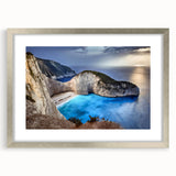 Framed wall art featuring a serene landscape of cliffs, designed with a sleek silver frame and mat, showcasing a modern aesthetic perfect for home decor.