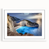 Framed wall art collection showcasing a stunning landscape of cliffs, featuring vibrant colors and intricate details, displayed with a white mat in a modern setting. This captivating piece enhances any interior decor, perfect for nature enthusiasts.