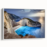 Framed canvas wall art showcasing an abstract cliff landscape design in earthy tones, complemented by a sleek white frame, perfect for modern home decor.