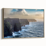 Elegant framed canvas wall art showcasing a stunning coastal cliff landscape design in gold tones, perfect for enhancing modern home decor. This piece captures the beauty of nature with intricate details and vibrant colors, making it an ideal statement piece for any room.
