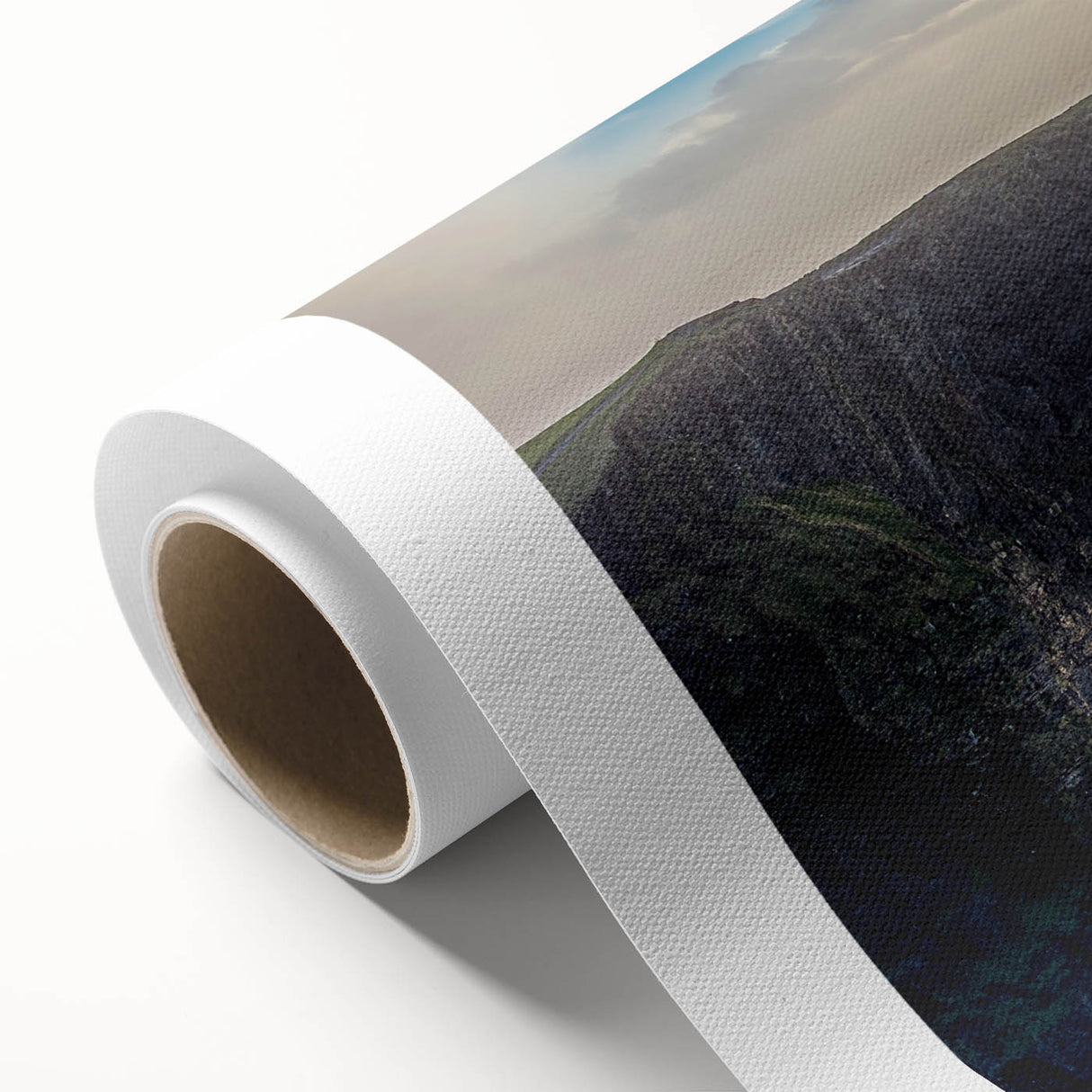 Vibrant rolled canvas showcasing a stunning landscape of rugged cliffs at sunset, perfect for home decor, with rich colors and textures emphasizing natural beauty.