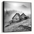 Framed canvas wall art showcasing a serene countryside landscape design, featuring rich green fields and a clear blue sky, viewed from a black side angle.