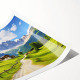 Rolled art print showcasing a serene countryside landscape with vibrant green fields and a blue sky, packaged securely in a durable cardboard tube. Ideal for home decor.