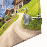 Close-up of a vibrant acrylic glass wall art piece depicting a serene countryside landscape, showcasing lush green fields and a clear blue sky, perfect for home decor.