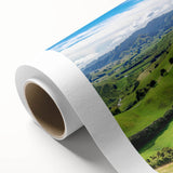 Rolled canvas artwork showcasing a serene countryside landscape with vibrant colors and detailed brushwork, ideal for home decor and art enthusiasts.