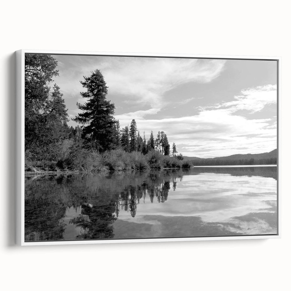 Framed canvas wall art depicting a serene countryside landscape design, showcasing vibrant greens and blues, with a white frame enhancing its elegant appeal. Perfect for home decor and nature enthusiasts.