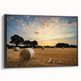 Framed canvas wall art depicting a serene countryside landscape with vibrant greens and blues, featuring a black frame that enhances its artistic appeal. Perfect for home decor enthusiasts seeking a touch of nature-inspired elegance.