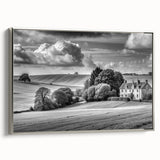 Framed canvas wall art showcasing a serene countryside landscape with vibrant green fields and a clear blue sky, accented by a sleek silver frame, ideal for home decor.