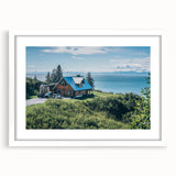 Framed wall art showcasing a picturesque countryside landscape in vibrant colors, set in a white mat and frame, perfect for home decor enhancement.