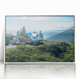 Framed acrylic wall art showcasing a serene countryside landscape with vibrant greenery and soft clouds, enhancing home decor with a touch of nature.