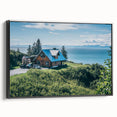 Framed canvas wall art showcasing a serene countryside landscape with lush greenery and rolling hills, featuring a sleek black frame that enhances its vibrant colors.