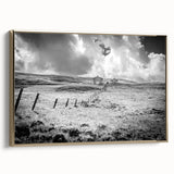 Framed canvas wall art showcasing a serene countryside landscape with vibrant colors, set in a gold frame, perfect for home decor and enhancing interiors.