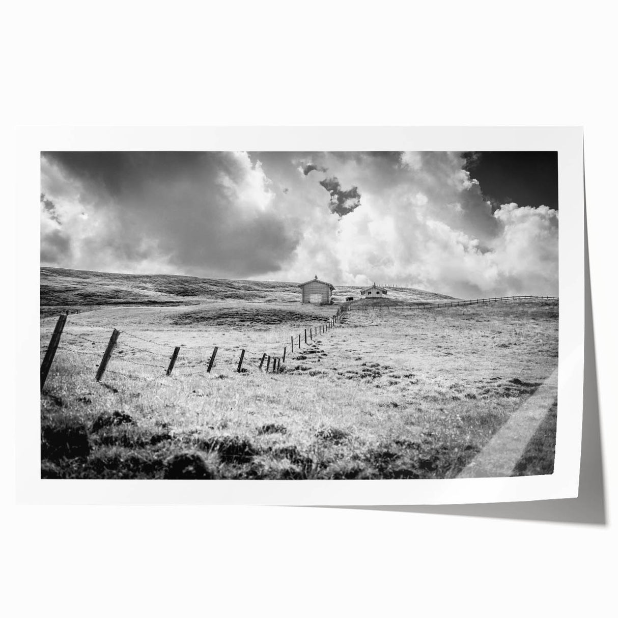 Scenic countryside landscape wall art print showcasing vibrant green fields and a serene sky, rolled for easy shipping and display. Perfect for home decor.
