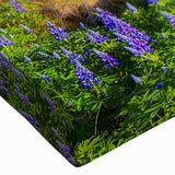 Close-up of a stretched canvas wall art piece showcasing a vibrant countryside landscape, featuring lush green fields, a serene sky, and rustic farm elements, perfect for home decor.